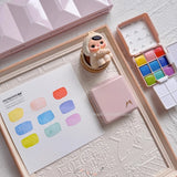 AOOKMIYA MAIRTINI Brilliant Rays New Solid Watercolor Paint 9-Color Pink Box Acuarela Travel Sketching Portable Set Art Supplies