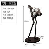 AOOKMIYA ART+ Creative Gifts Creative humanoid sculpture floor lamp ball designer exhibition hall living room lobby large figure FRP ornaments