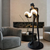 AOOKMIYA ART+ Creative Gifts Nordic humanoid sculpture floor lamp creative ball holding designer exhibition hall, hotel sales office, character decoration st