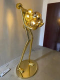 AOOKMIYA ART+ Creative Gifts Creative humanoid sculpture floor lamp ball designer exhibition hall living room lobby large figure FRP ornaments