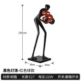 AOOKMIYA ART+ Creative Gifts Creative humanoid sculpture floor lamp ball designer exhibition hall living room lobby large figure FRP ornaments