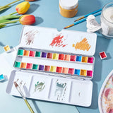 AOOKMIYA Empty Watercolor Palette with 26 Empty Half Pans, Empty Watercolor Tin with Fold Out Palette, Watercolor Tray for Painting  AOOKMIYA.COM