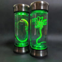 AOOKMIYA Alien Glow Jar Xenomorph Specimen Facehugger Embryo Glass Jar Movie Prop Replica Home Decor Desktop Crafts Sculpture Decoration