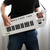 AOOKMIYA Guitar Electronic Piano Mini Keyboard 37-Key Rechargeable Children Electronic Keyboard Instruments Piano Back Shoulder Carrying AOOKMIYA.COM