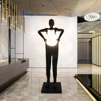 AOOKMIYA ART+ Creative Gifts Nordic humanoid sculpture floor lamp creative ball holding designer exhibition hall, hotel sales office, character decoration st
