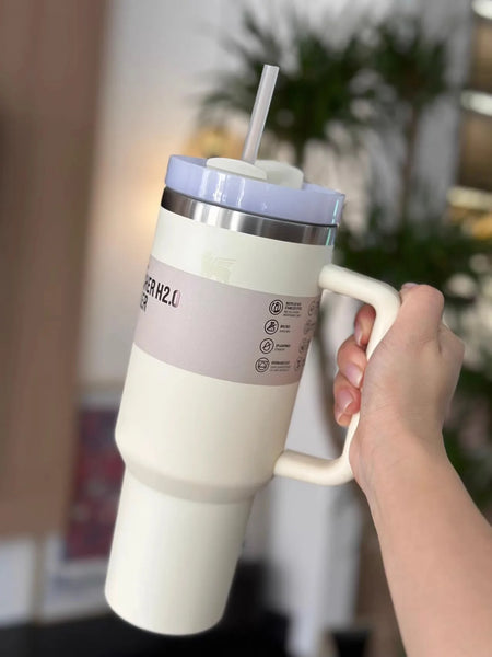 https://www.aookmiya.com/cdn/shop/files/Stanley-Quencher-2-0-Stainless-Steel-Vacuum-Insulated-Tumbler-with-Lid-and-Straw-40oz-Thermal-Travel_f9a7221d-49b5-4731-b642-e3c9ceb4854e_grande.webp?v=1701178361