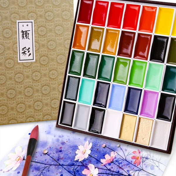 https://www.aookmiya.com/cdn/shop/products/Sakura-24-48-60-color-solid-watercolor-paint-set-pearlescent-color-professional-advanced-watercolor-painting-art_grande.jpg?v=1615471081